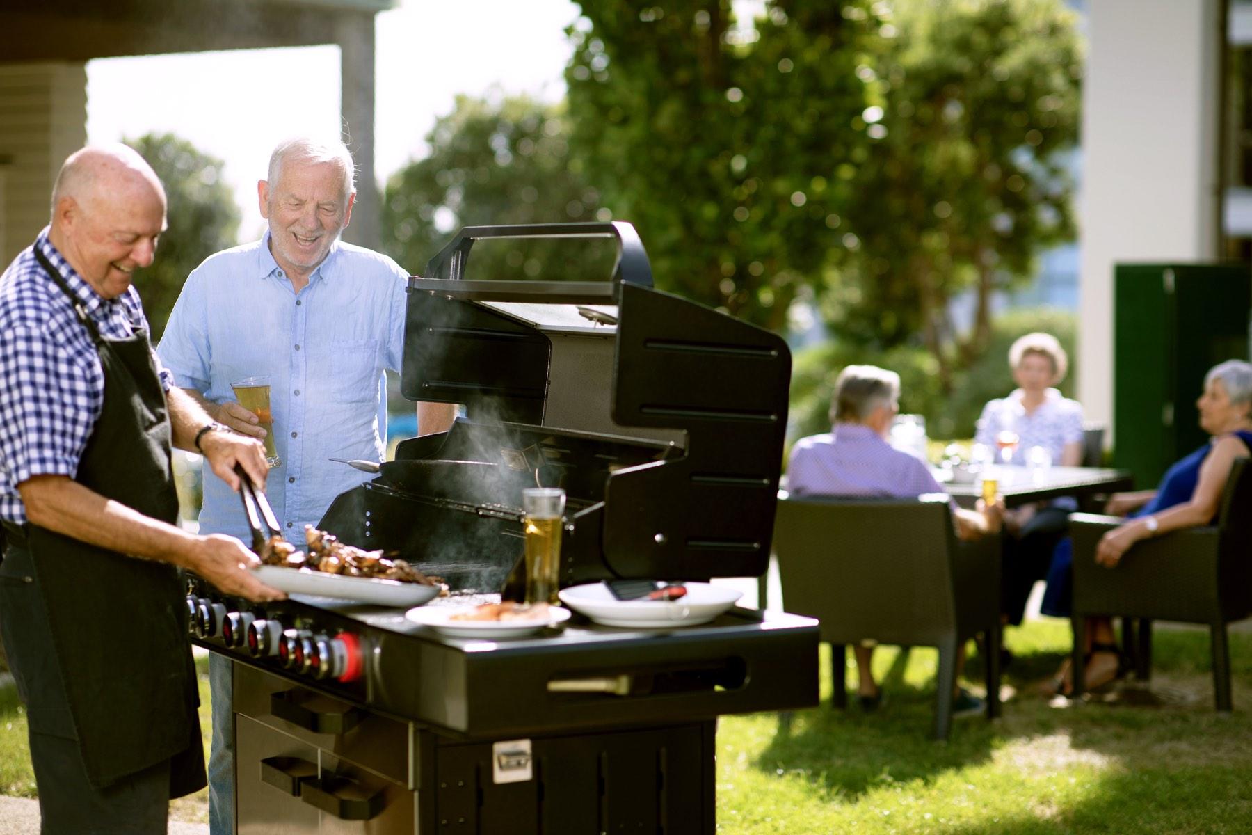 Retirement village residents barbecuing