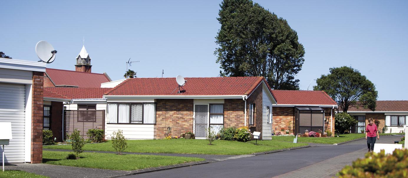 St Johns driveway with resident walking
