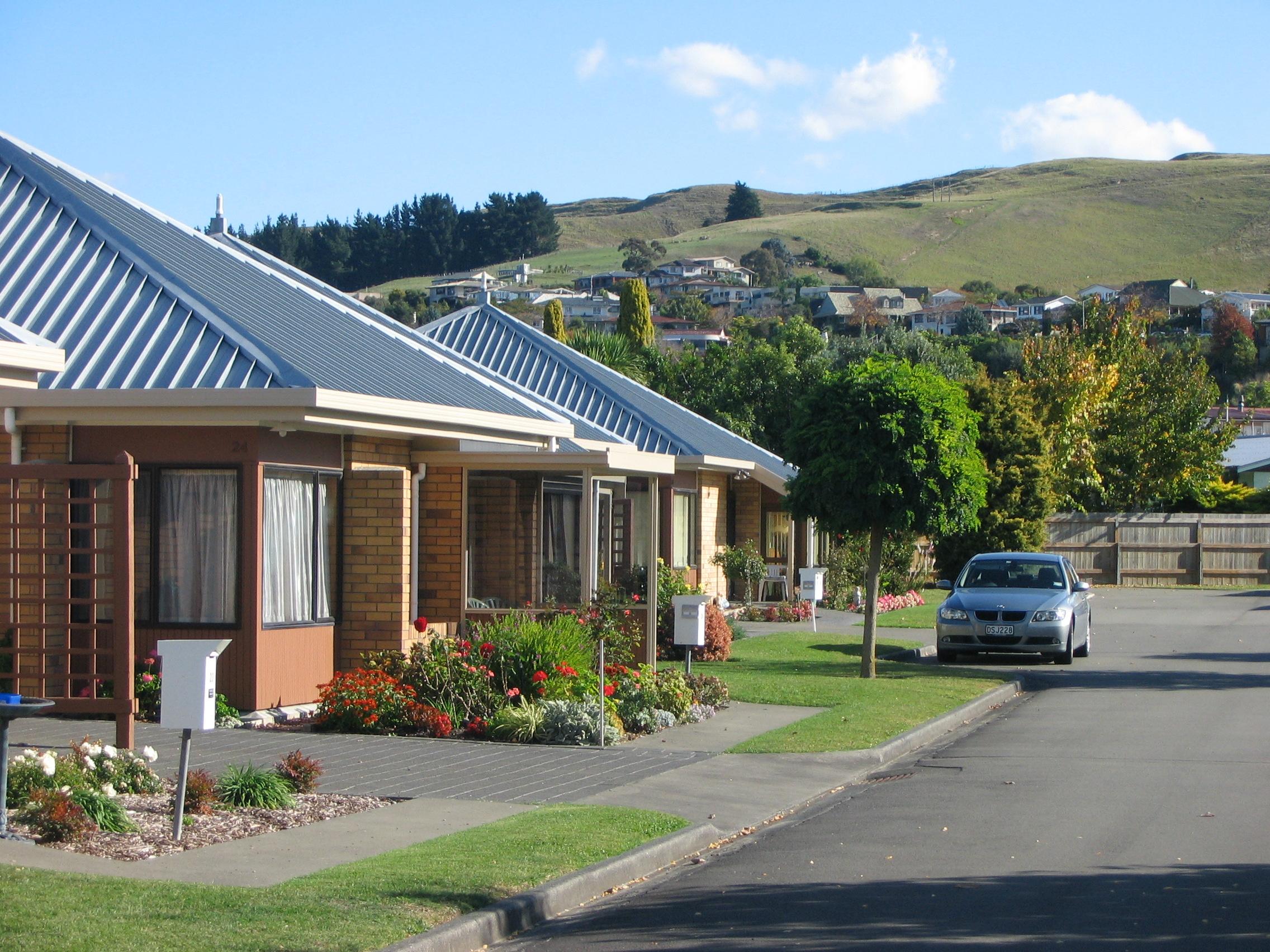 Retirement villas with hills in background