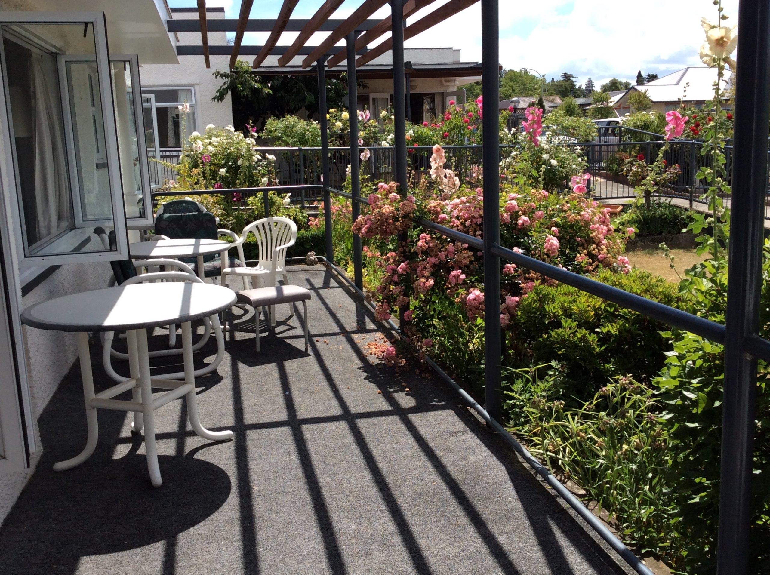 Woburn aged care centre patio with flowers